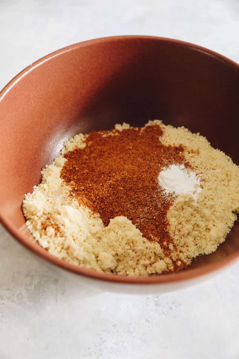 dry ingredients for cookies in a brown bowl.