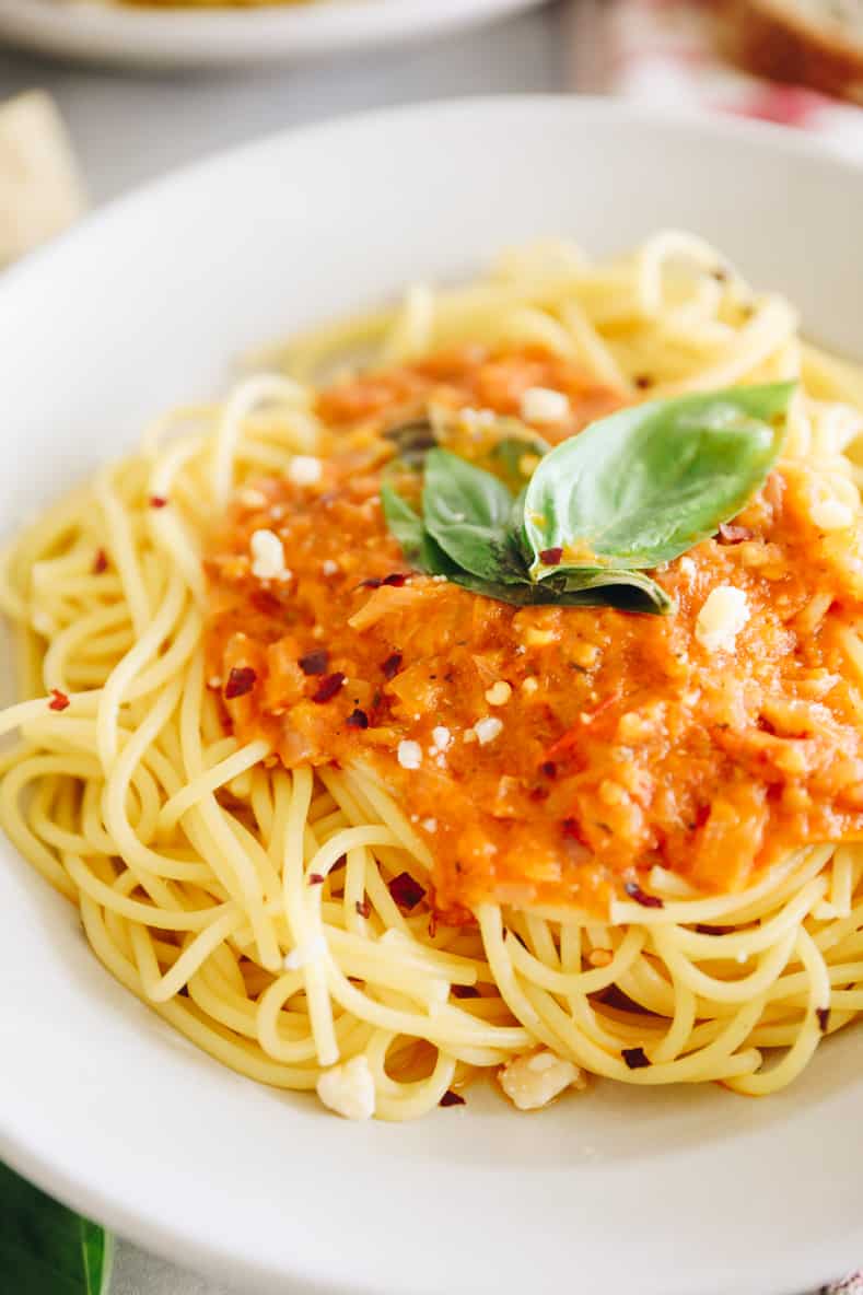 Final plated meal of spicy arrabbiata sauce over spaghetti.