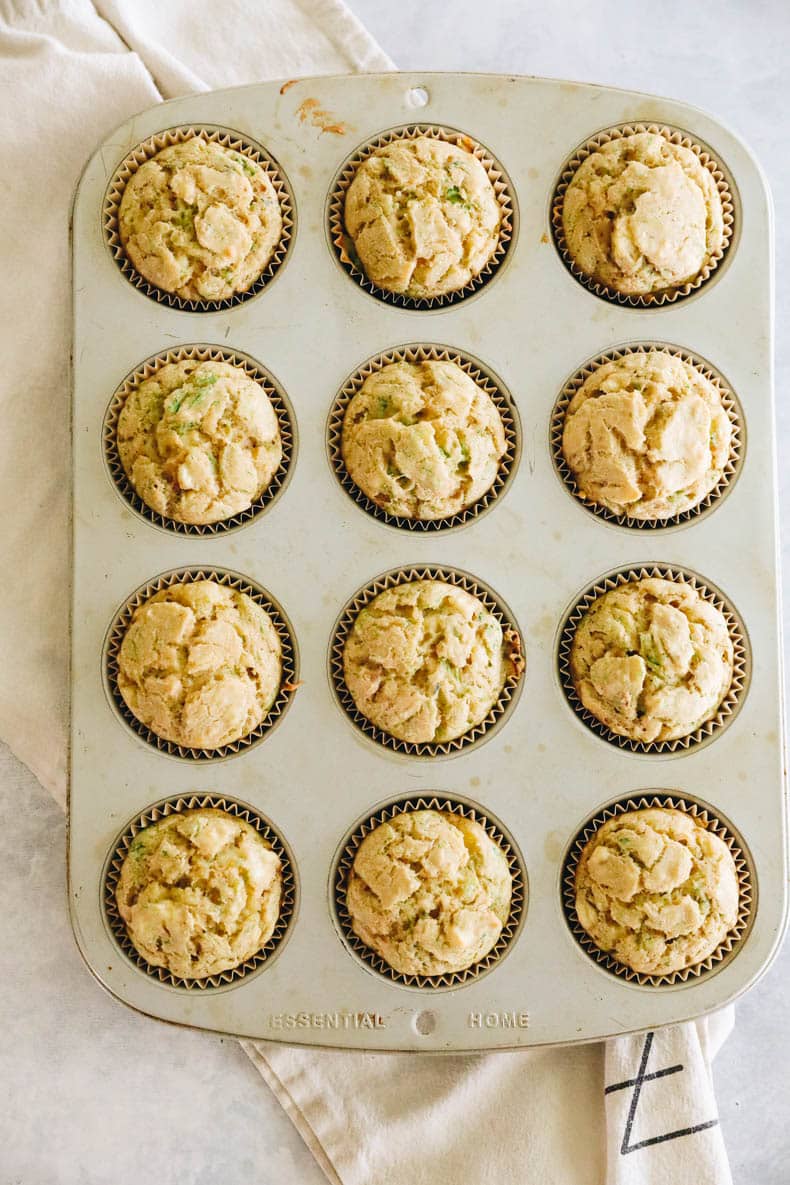 banana zucchini muffins in a muffin tin.