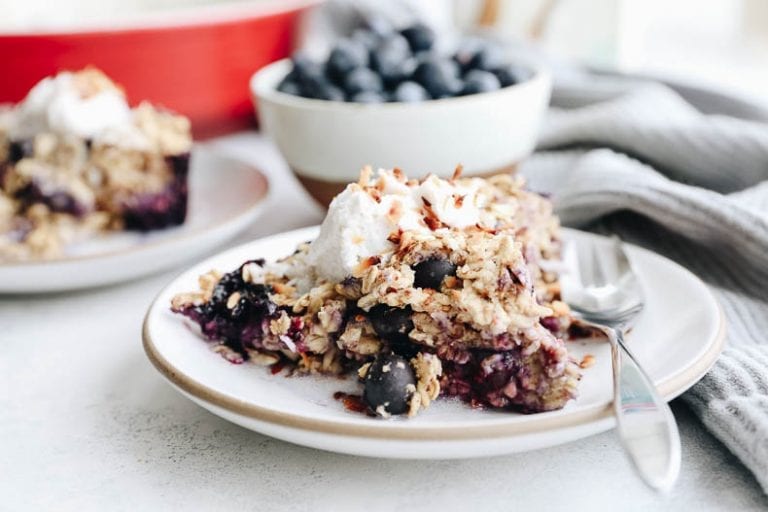 Change up your breakfast game with this Blueberry Coconut Baked Oatmeal. An easy, vegan, breakfast option that you can bake ahead of time for weekday breakfasts or fresh for a fancy weekend brunch.