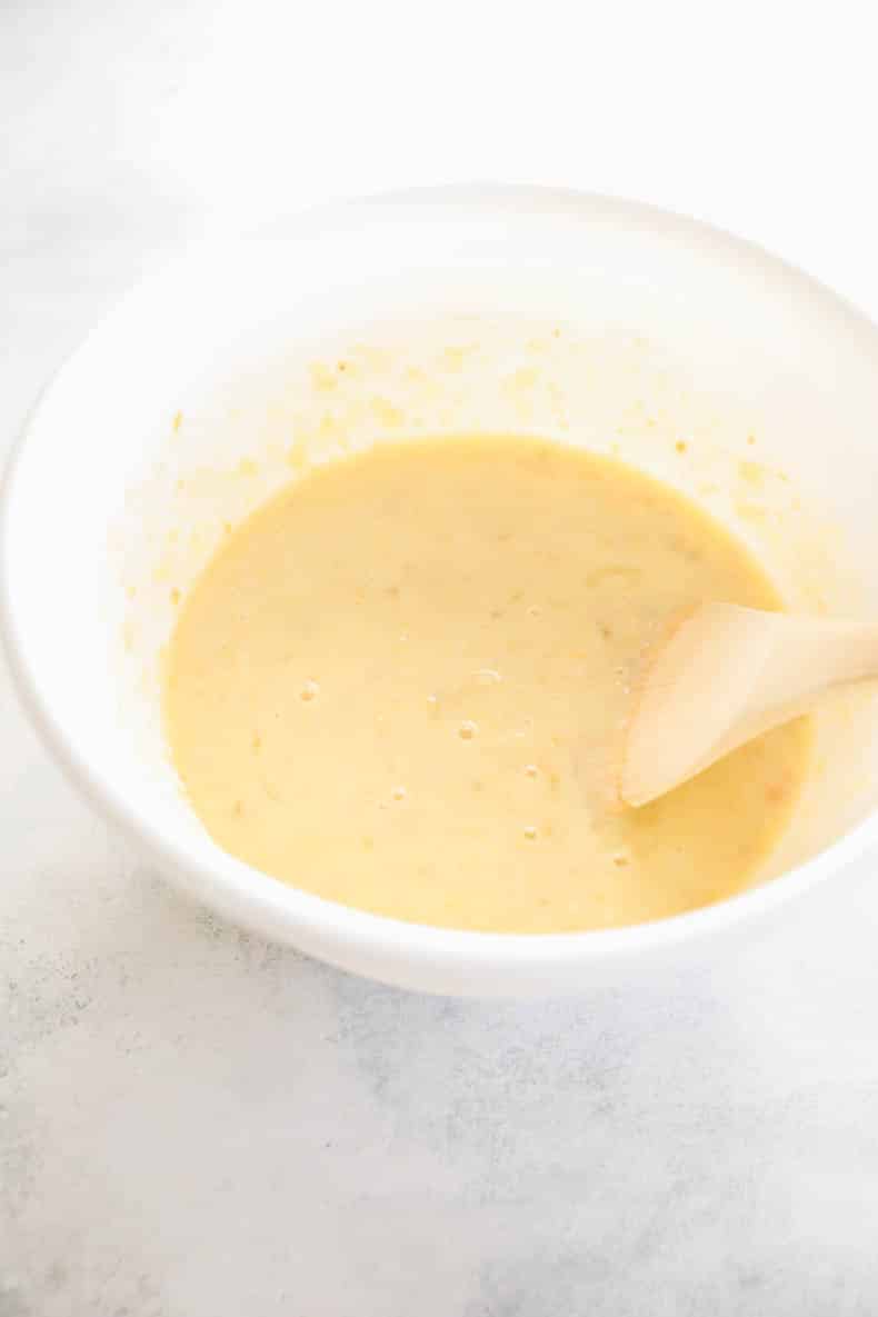 breakfast bar batter in a white mixing bowl