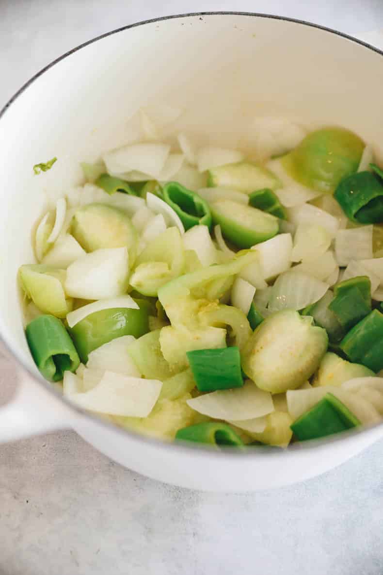 Cooked chicken pozole veggies in dutch oven