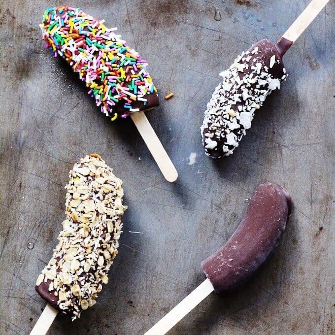 A healthy summer snack made from 3 simple ingredients! These Chocolate-Covered Banana Pops are easily customizable, kid-friendly and a delicious recipe straight from the freezer.