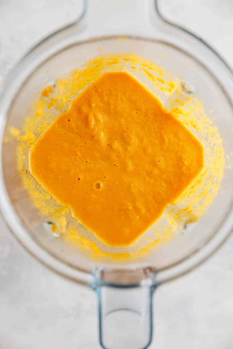 Ginger salad dressing blended up in a blender.