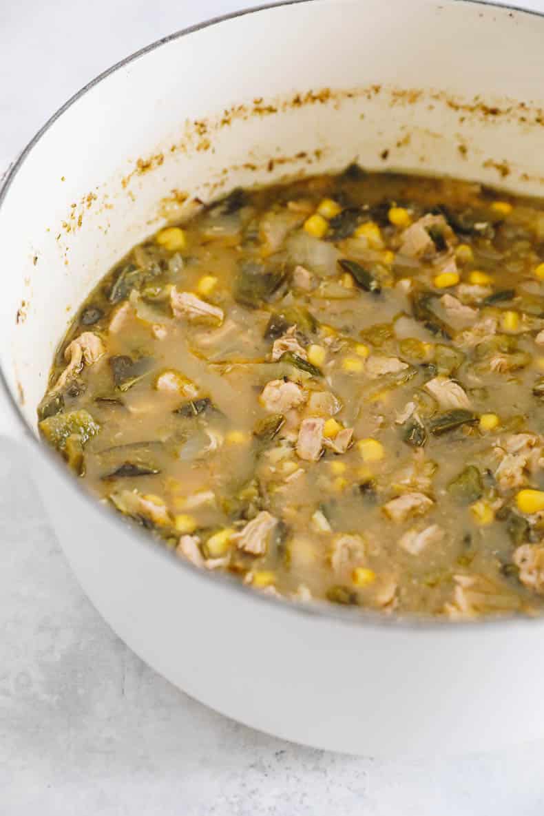 Green chicken chili recipe in a large dutch oven.