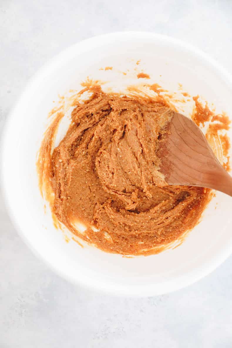 peanut butter cookie dough mixed in a white bowl.