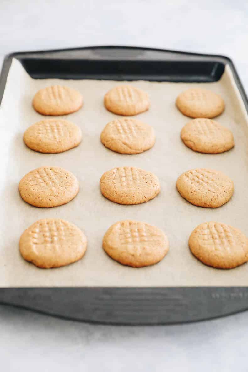 healthy peanut butter cookies on a baking sheet.