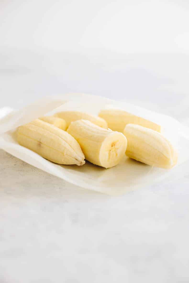 peeled frozen bananas in a reusable ziploc bag.