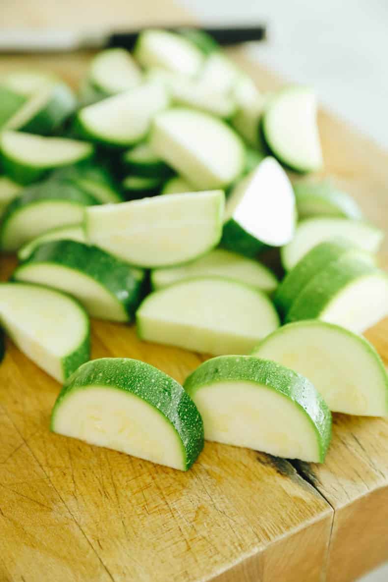 chopped zucchini on a cutting board.