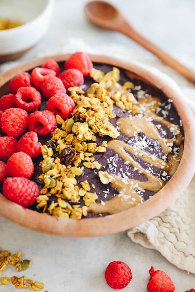 how to make an acai bowl with all the toppings.