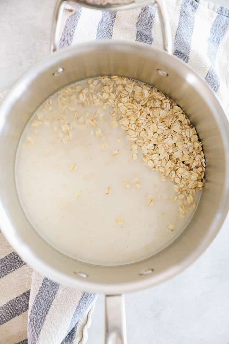 rolled oats in a pot with milk