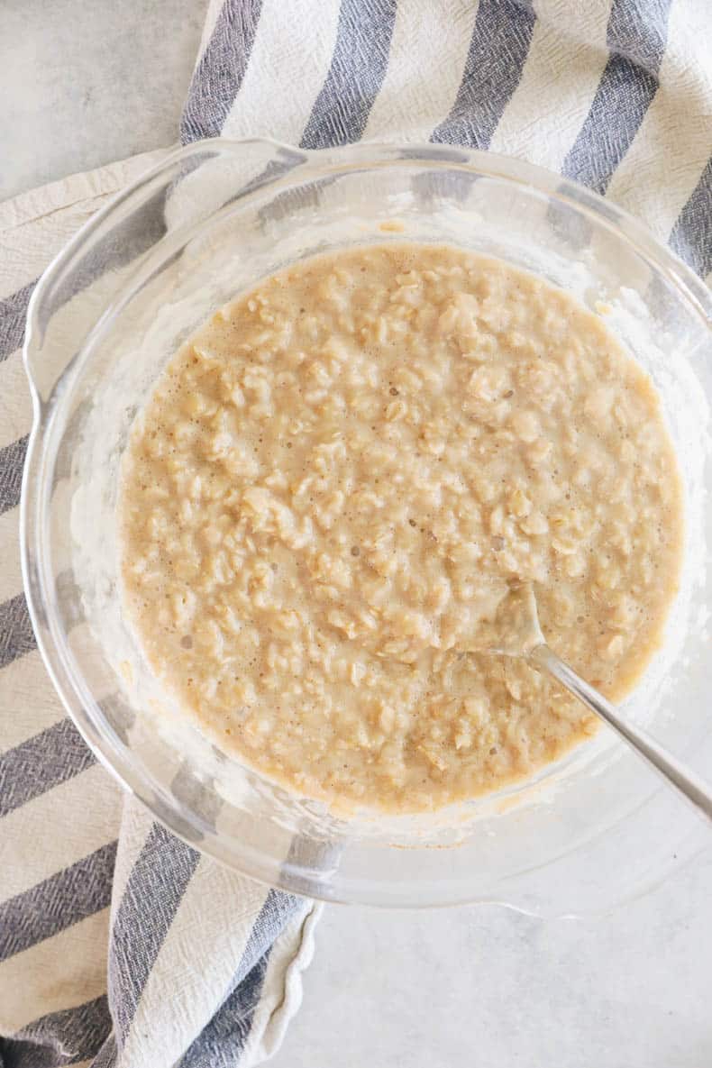 oatmeal in a glass bowl that was cooked in the microwave.