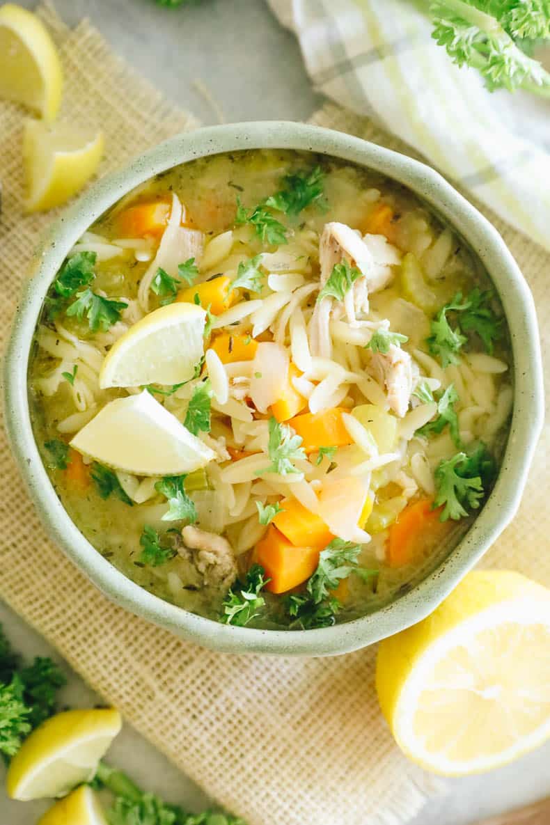 Overhead image of lemon chicken orzo soup.