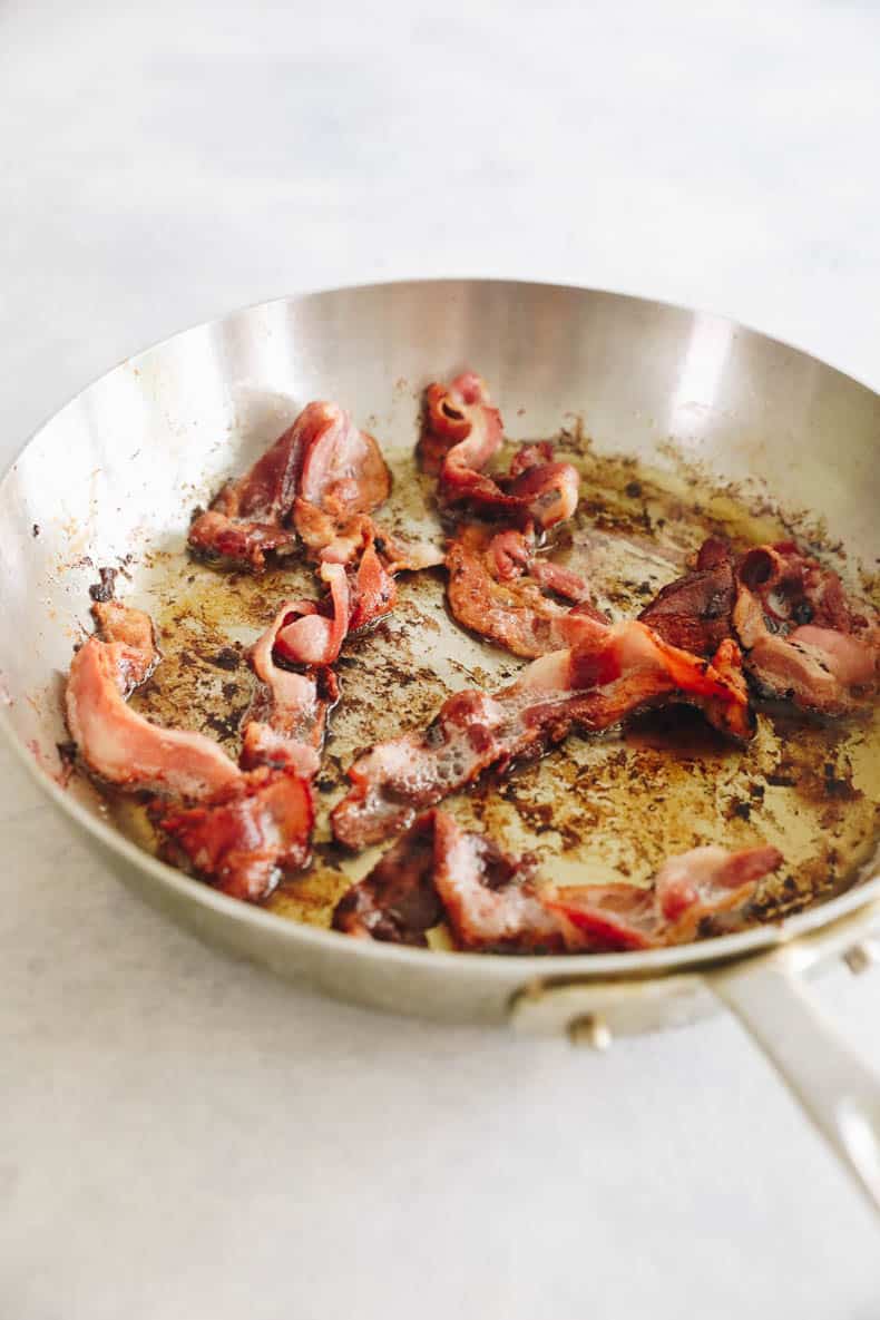 Cooked bacon in a skillet.