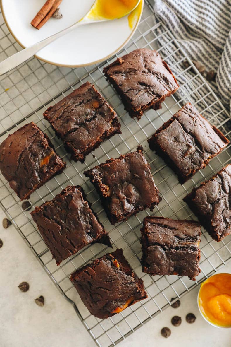 overhead image of pumpkin brownies cooling on a wire rack.