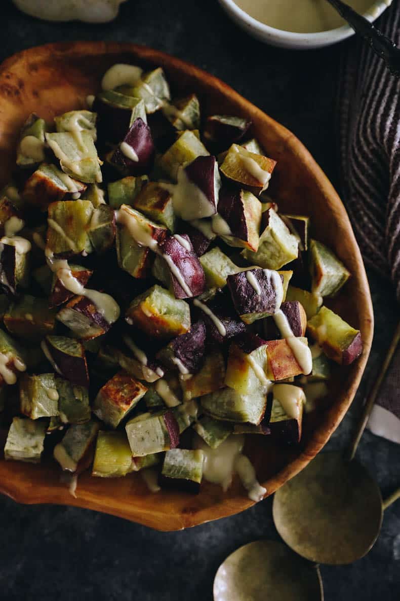 Roasted Japanese sweet potato that's been cubed and roasted and topped with a miso dressing.