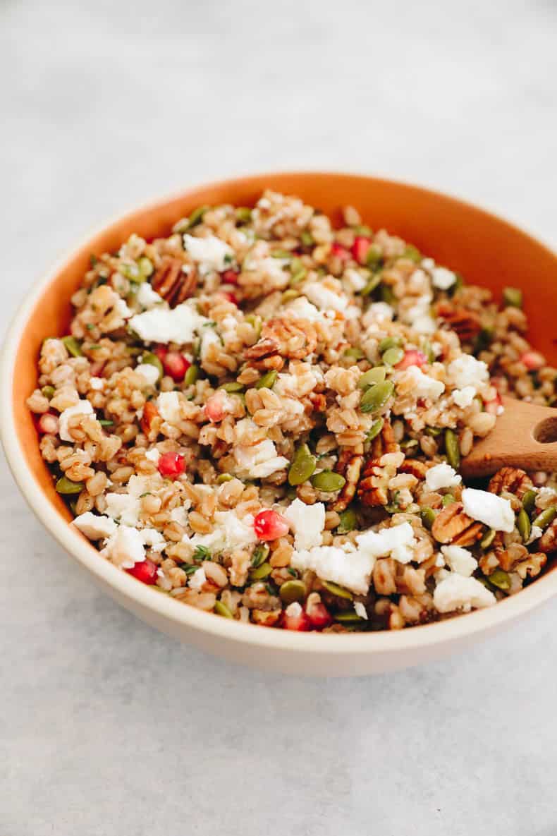 farro salad with pecans, pepitas, pomegranate seeds and goat cheese.