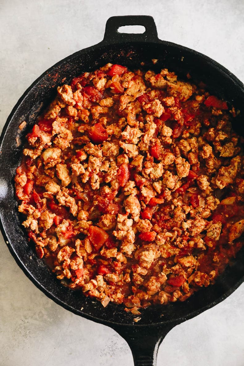 ground turkey taco meat in  cast-iron skillet